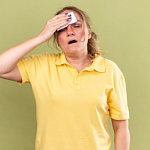 Приливы жара и пота у женщин: причины